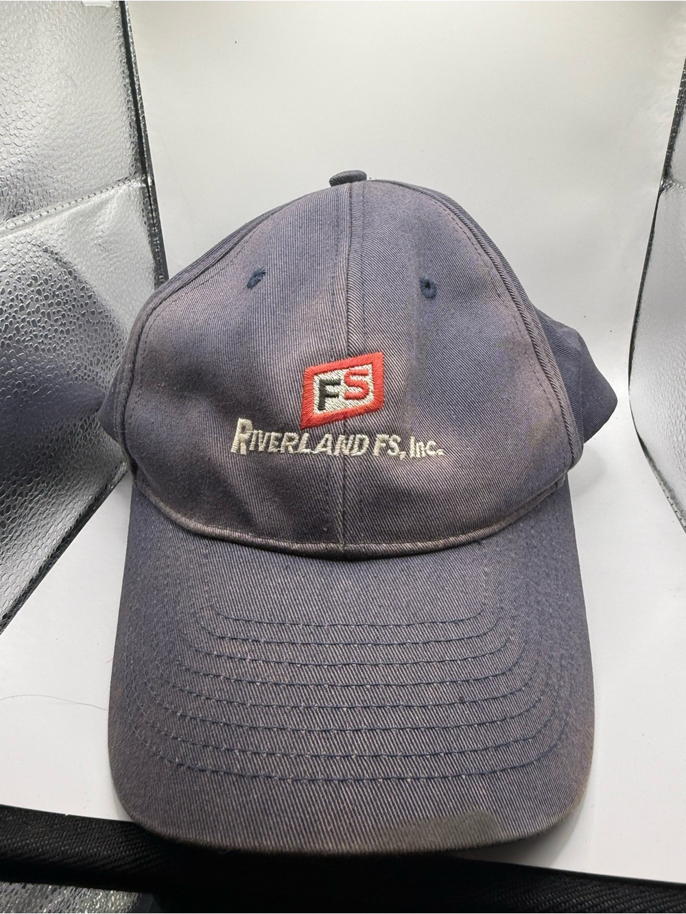Riverland FS Inc. Embroidered Navy Logo Baseball Cap